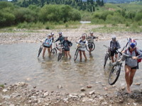 Kazakhstan and Kyrgyzstan MTB crossing a river